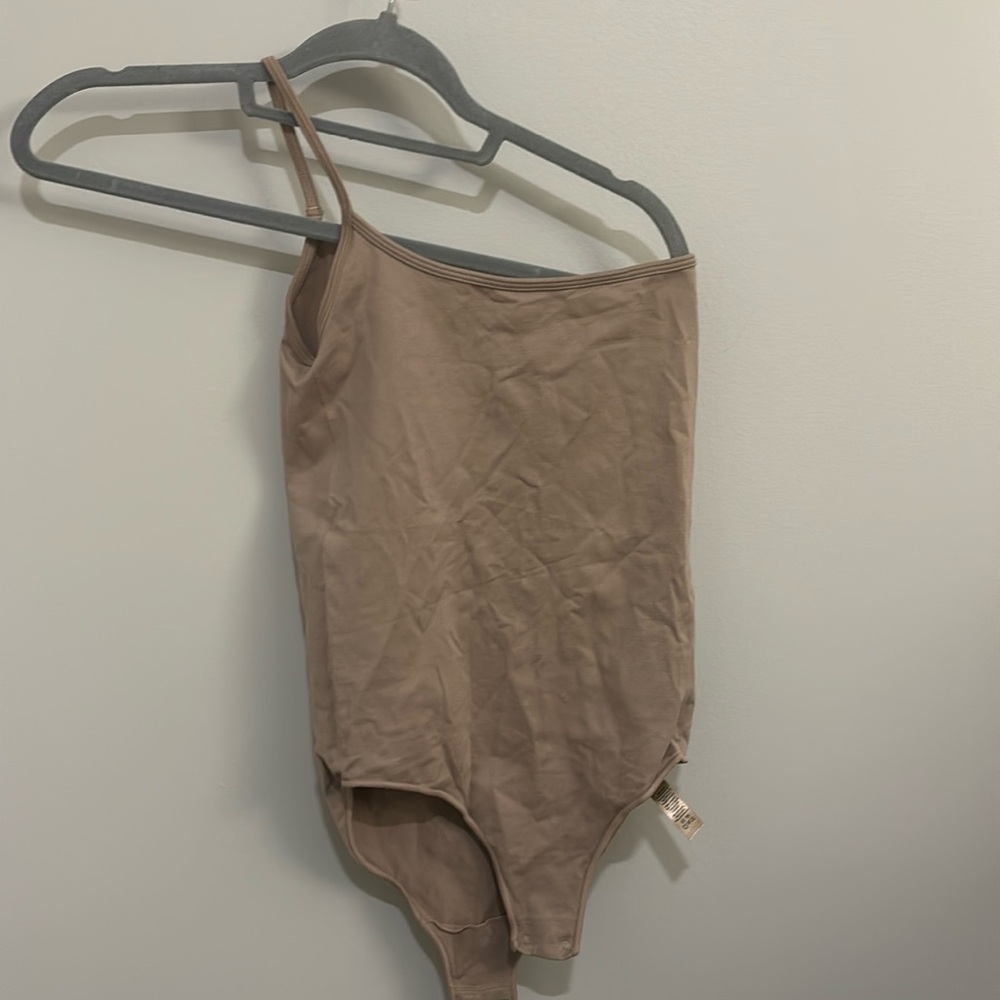 One shoulder body suit